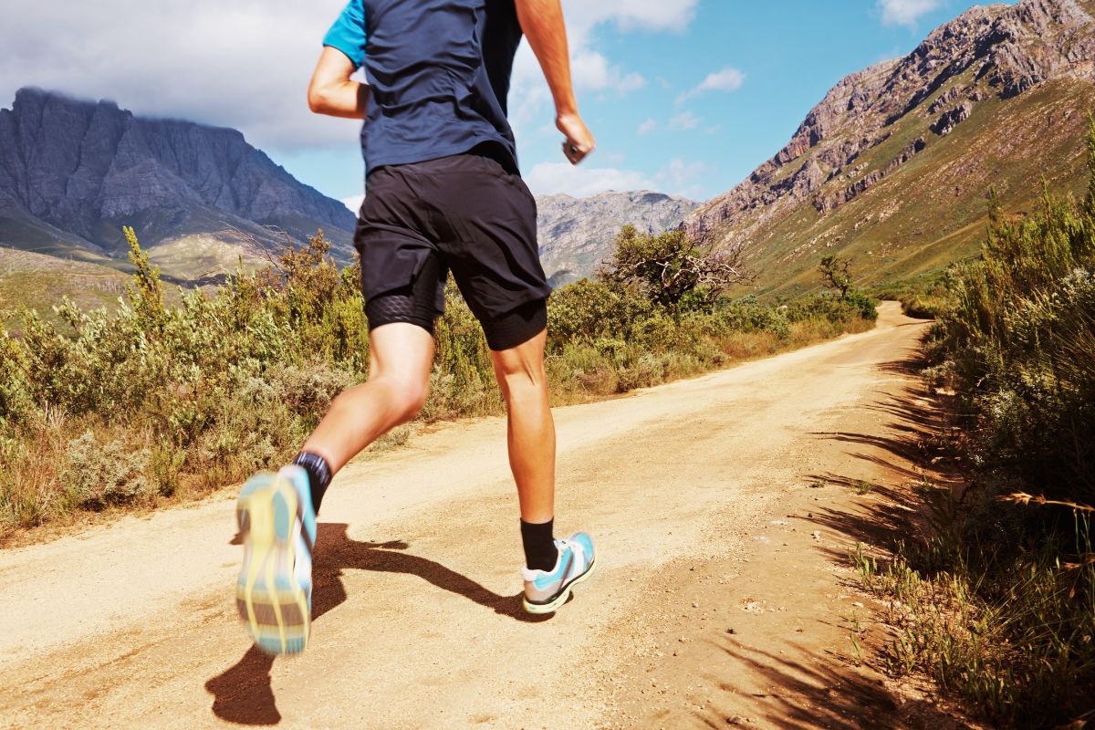 Runner training on a mountain trail